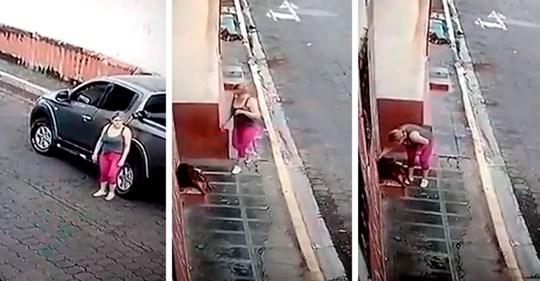 Uma mulher encontra cachorro abandonado e ferido, para o carro e o resgata